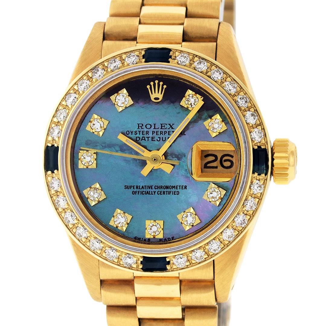 Rolex Ladies 18K Yellow Gold Sapphire And Tahitian MOP: One Ladies 18K Yellow Gold Rolex President Polished, Serviced & Electronically Tested, Yellow Gold Case: 26mm, 18K Yellow Gold Crown, Custom Bezel: 18K Yellow Gold Sapphire Beadset Diamond Bezel, Diam