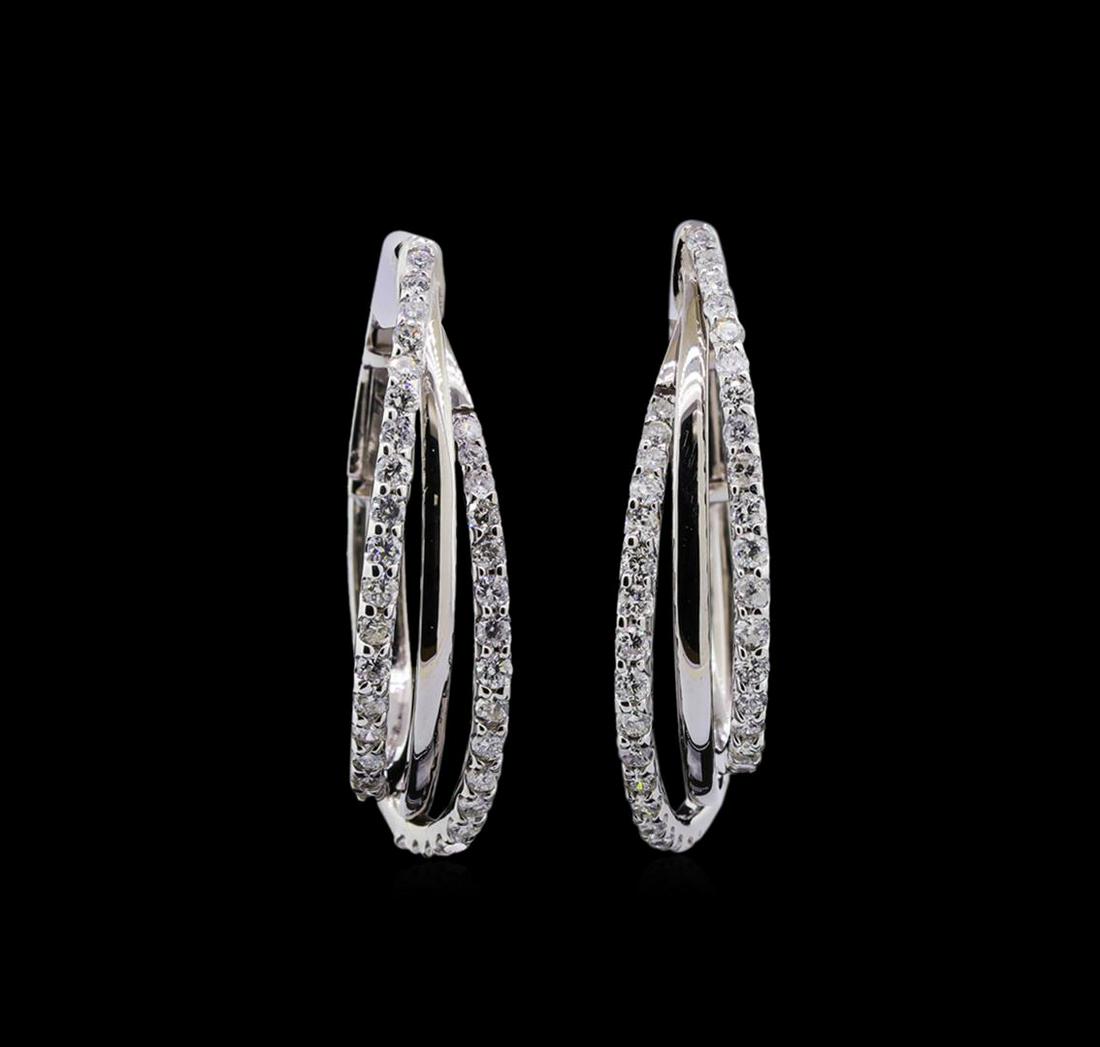 0.99 ctw Diamond Earrings - 14KT White Gold: One pair electronically tested 14KT white gold lady's combination cast & assembled fashion earrings with Omega clip backs with posts with a bright polish finish. Identified with markings of "K14". Con