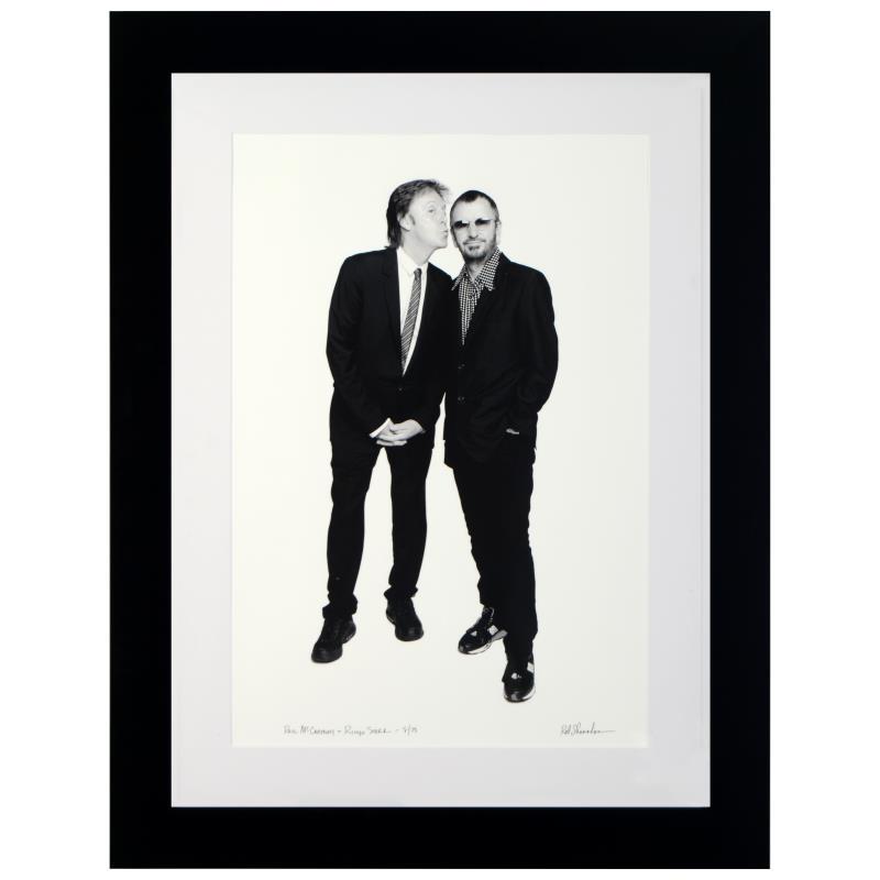 Paul McCartney & Ringo Starr by Shanahan, Rob: "Paul McCartney & Ringo Starr" is a limited edition giclee on paper, numbered and hand signed by acclaimed music industry photographer Rob Shanahan. This piece comes custom framed. Includes Certificat