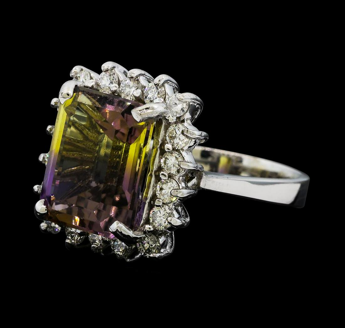 7.70 ctw Morganite and Diamond Ring - 14KT White Gold: One Morganite and Diamond Ring including: 14KT White Gold weighing a total of 6.00 grams, Morganite weighing a total of 7.70ct, and 58 Diamonds weighing a total of 0.49ctw.