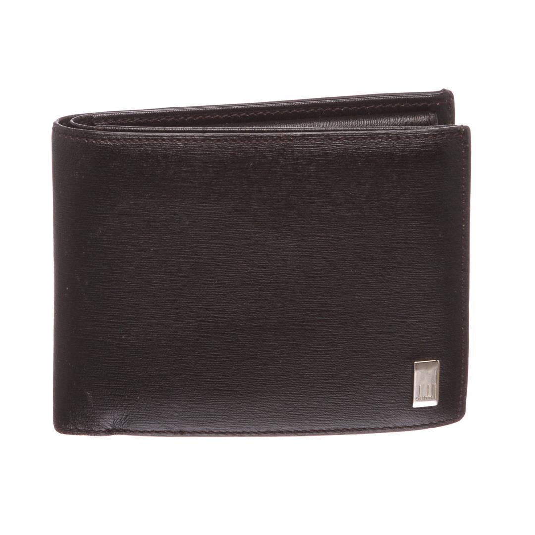 Dunhill Black Leather Bi Fold Wallet: Dunhill black leather bi fold wallet. Inner four card slot, money slip pocket, snap closure change pocket and leather lining. Authentic.