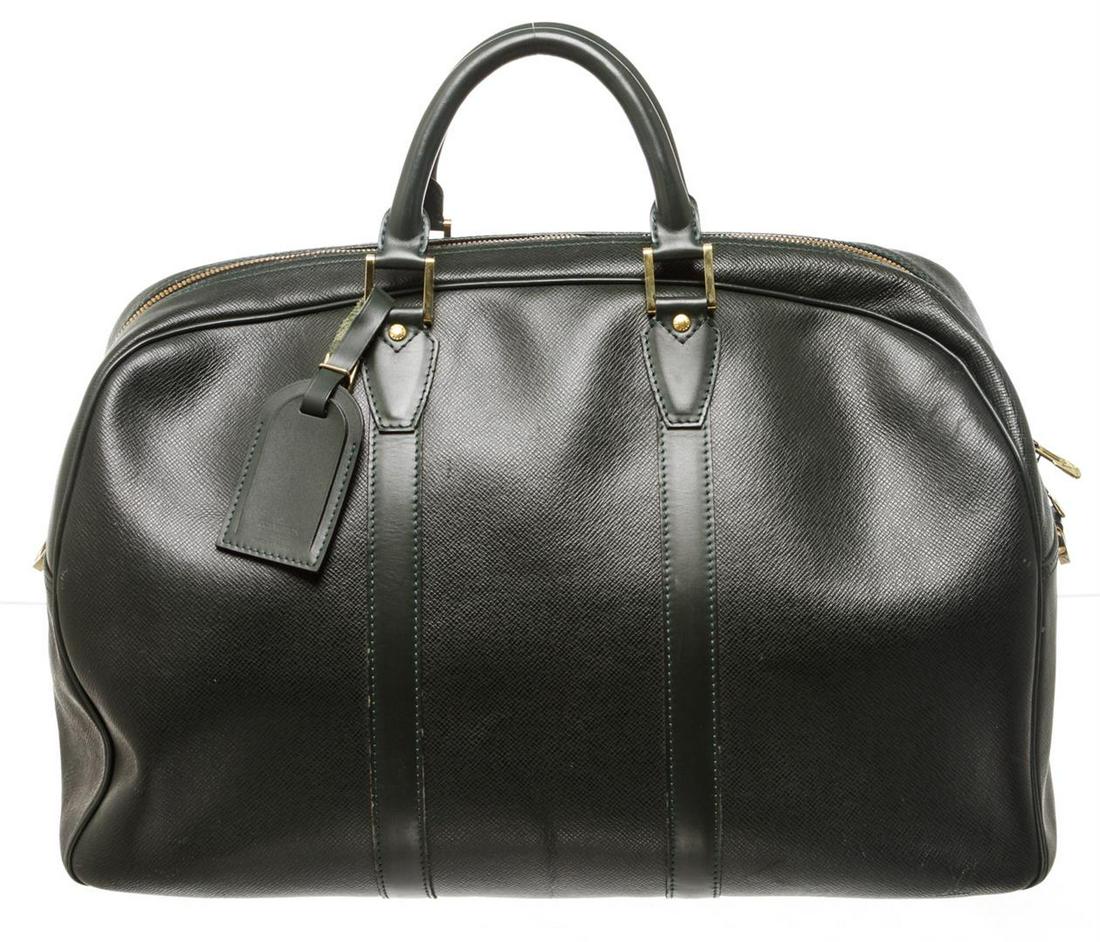 Louis Vuitton Green Taiga Leather Kendall GM Travel Bag: Green Taiga Louis Vuitton Kendall GM with silver-tone hardware, dual rolled top handles, detachable adjustable shoulder strap, tonal hide and Alcantara lining and two-way zip closure at top. Authentic