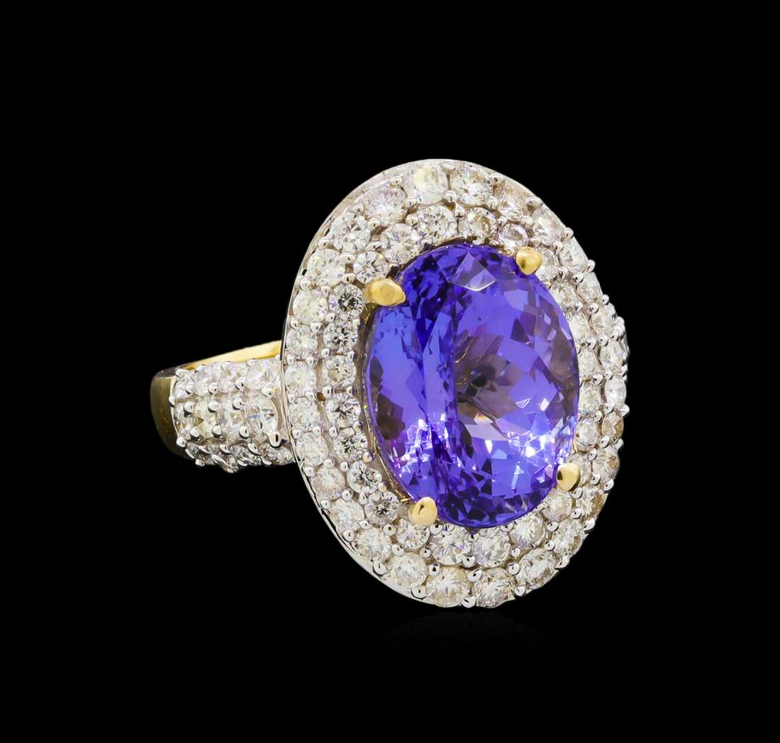 14KT Two-Tone Gold 5.40 ctw Tanzanite and Diamond Ring: One electronically tested 14KT white and yellow gold ladies combination cast & assembled tanzanite and diamond ring with a flat shank with a bright polish finish. Identified with markings of "14K". Co