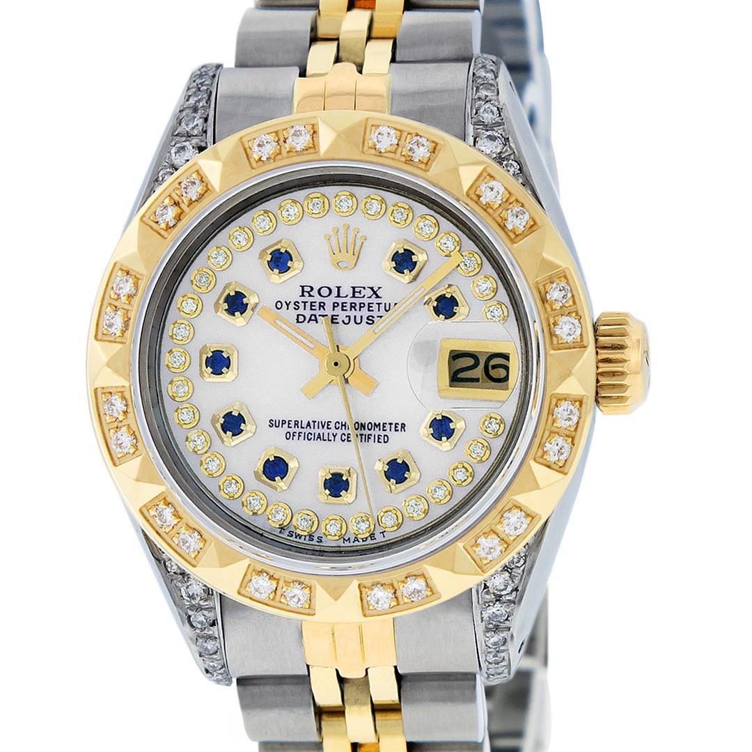 Rolex Ladies 2 Tone 14K MOP Sapphire & Pyramid Diamond: One Ladies 14K Two Tone Rolex Datejust Polished, Serviced & Electronically Tested, 14K Yellow Gold & Stainless Steel Case: 26mm, 14K Yellow Gold Crown, Diamond Lugs: 24 Diamonds On Lugs, Clarity: SI-V