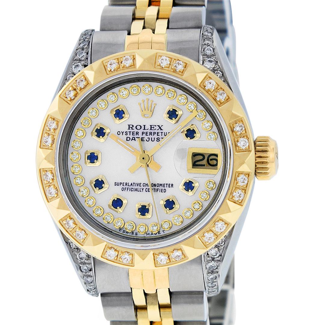 Rolex Ladies 2 Tone 18K MOP Sapphire String Diamond: One Ladies Quickset 18K Two Tone Rolex Datejust Polished, Serviced & Electronically Tested, 18K Yellow Gold & Stainless Steel Case: 26mm, 18K Yellow Gold Crown, Diamond Lugs: 24 Diamonds On Lugs, Clar