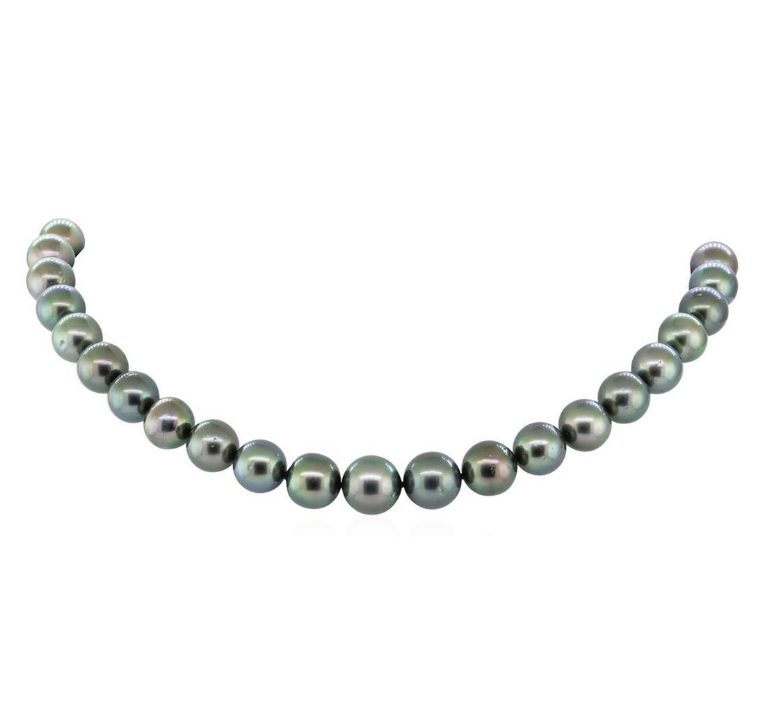 Tahitian Pearl Necklace - 14KT White Gold: One graduated, single strand cultured Tahitian pearl necklace. The strand has each pearl individually hand knotted and measures 18 inches in length. The necklace is finished with a scalloped 14KT whit