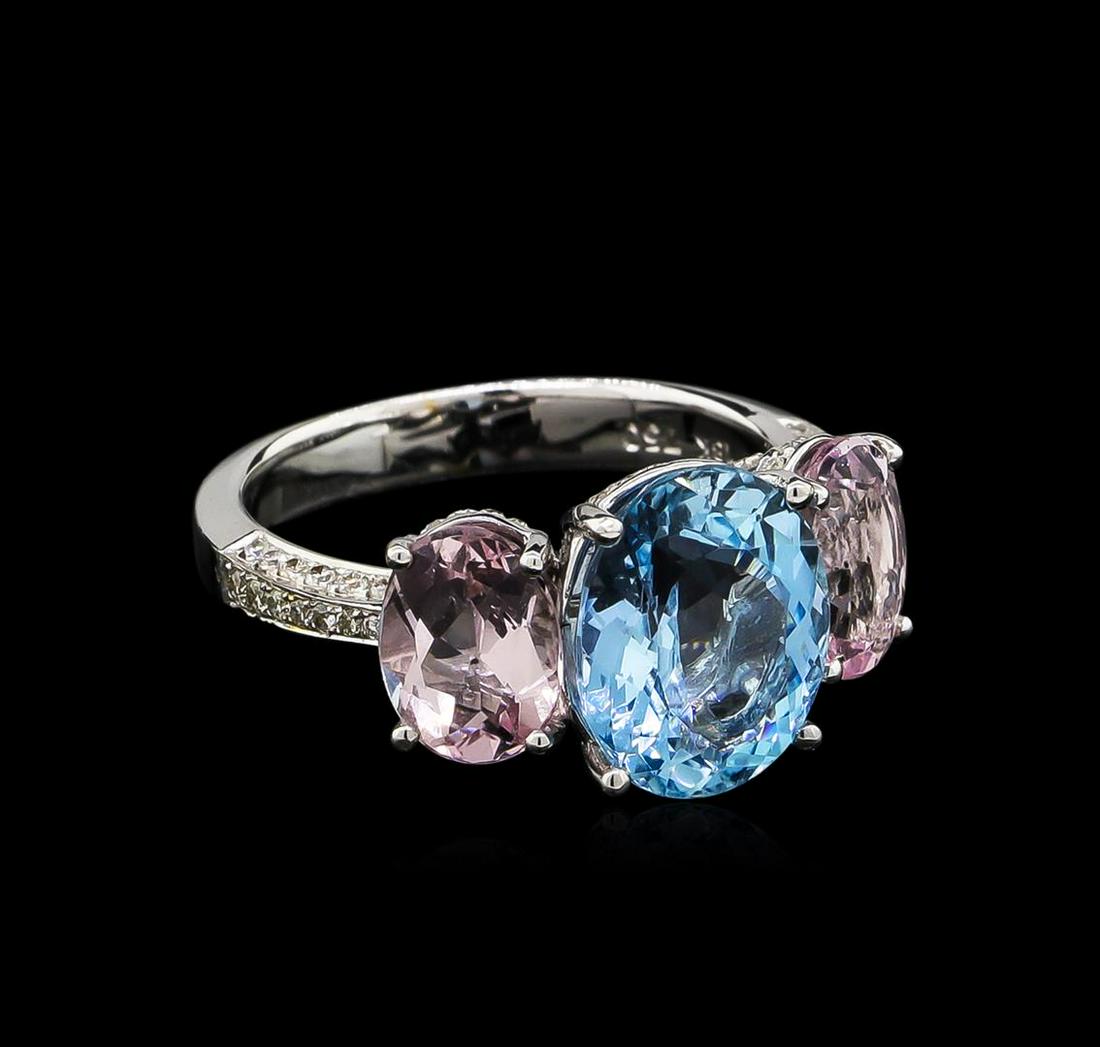 3.56 ctw Aquamarine, Morganite and Diamond Ring - 18KT: One electronically tested 18KT white gold ladies cast aquamarine, morganite & diamond ring with a bright polish finish. The featured aquamarine is set between a morganite on either side supported by a