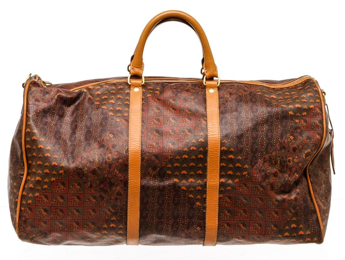 Escada Brown Coated Canvas Leather Vintage Duffle Bag: One Escada Brown Coated Canvas Leather Vintage Duffle Bag. Escada brown multicolor printed coated canvas large vintage duffel bag with brown leather trim, gold-tone hardware, brown canvas lining, inte