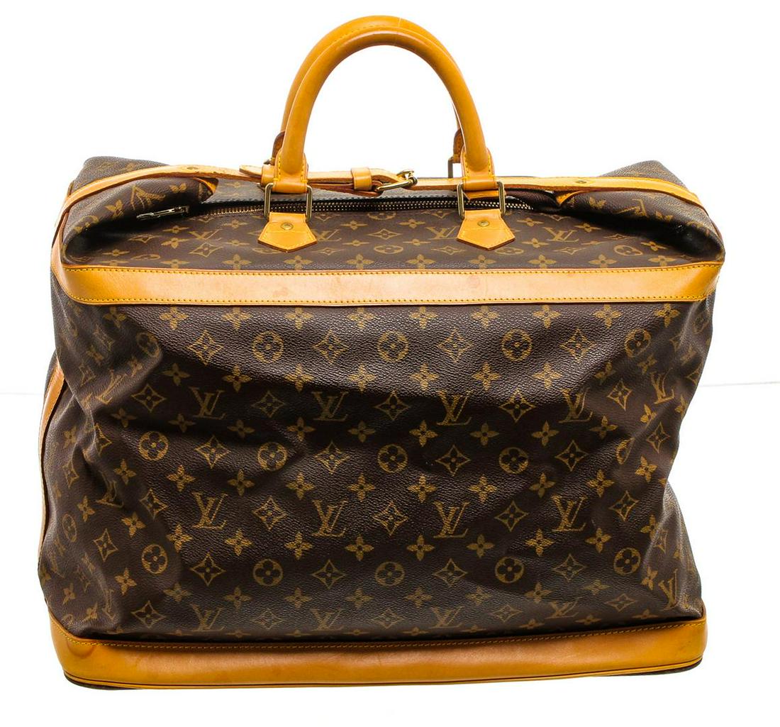 Louis Vuitton Monogram Canvas Leather Cruiser 45 cm: One Louis Vuitton Monogram Canvas Leather Cruiser 45 cm Luggage. Brown and tan monogram coated canvas Louis Vuitton Cruiser with brass hardware, tan vachetta leather accents, dual rolled top handles, 