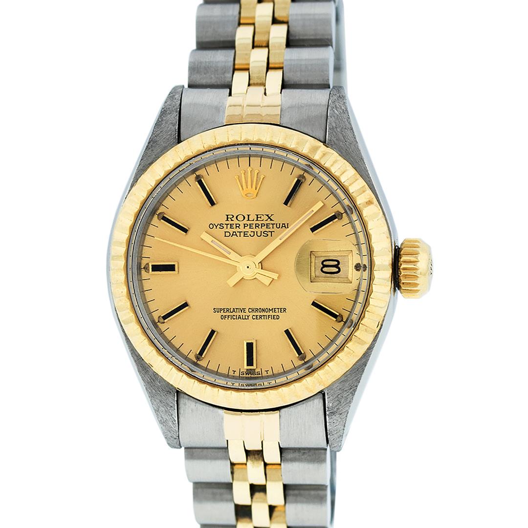 Rolex Ladies 2 Tone 14K Champagne Index 26MM Datejust: One Ladies 14K Two Tone Rolex Datejust Polished, Serviced & Electronically Tested, 14K Yellow Gold & Stainless Steel Case: 26mm, 14K Yellow Gold Crown, Bezel: 14K Yellow Gold Fluted Bezel. Custom Crys