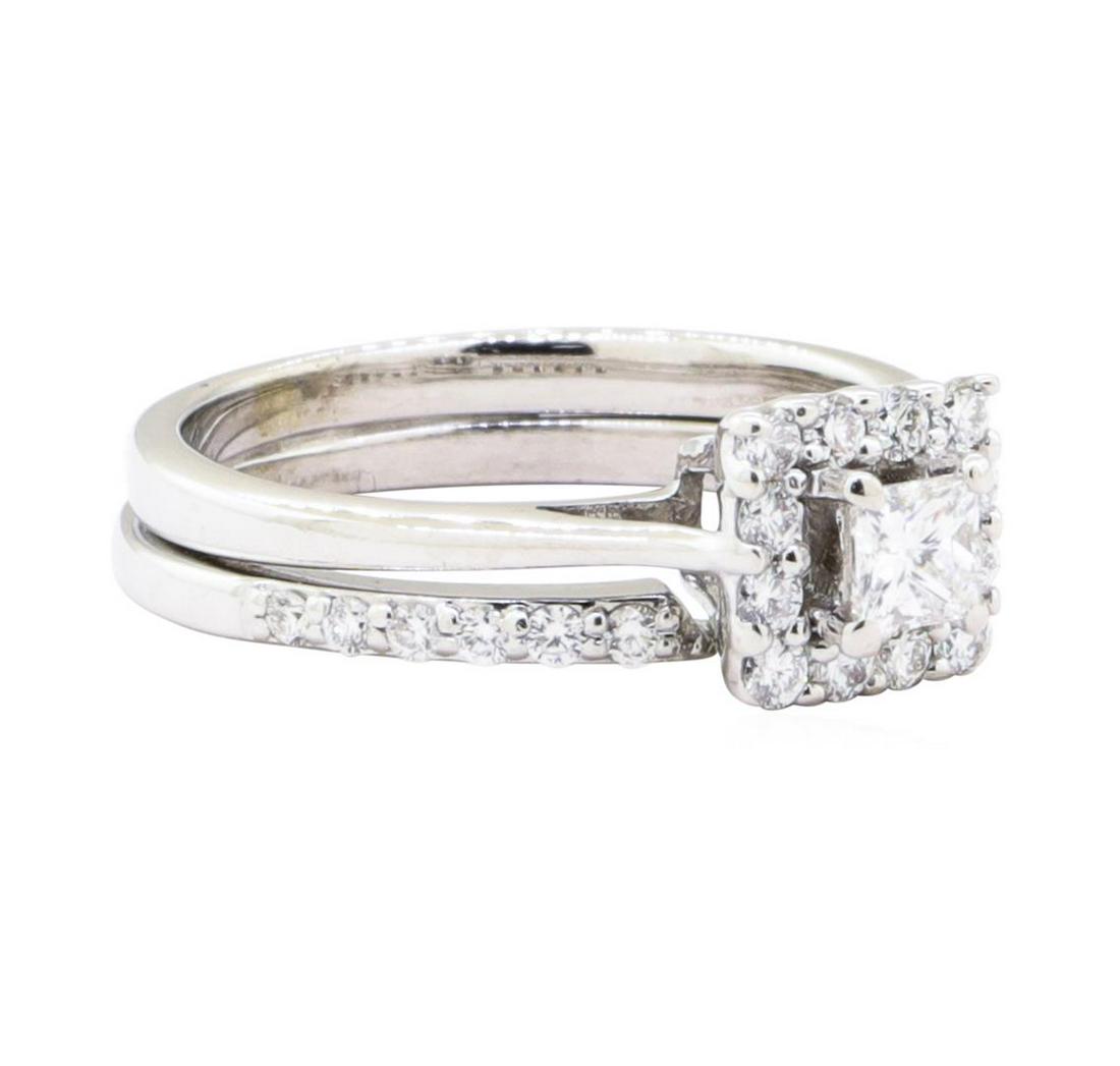 0.67 ctw Diamond Ring And Attached Band - 14KT White: One set electronically tested 14KT white gold lady's combination cast & assembled wedding ring and attached band with a square cathedral basket halo with a bright polish finish. The featured lady's ri