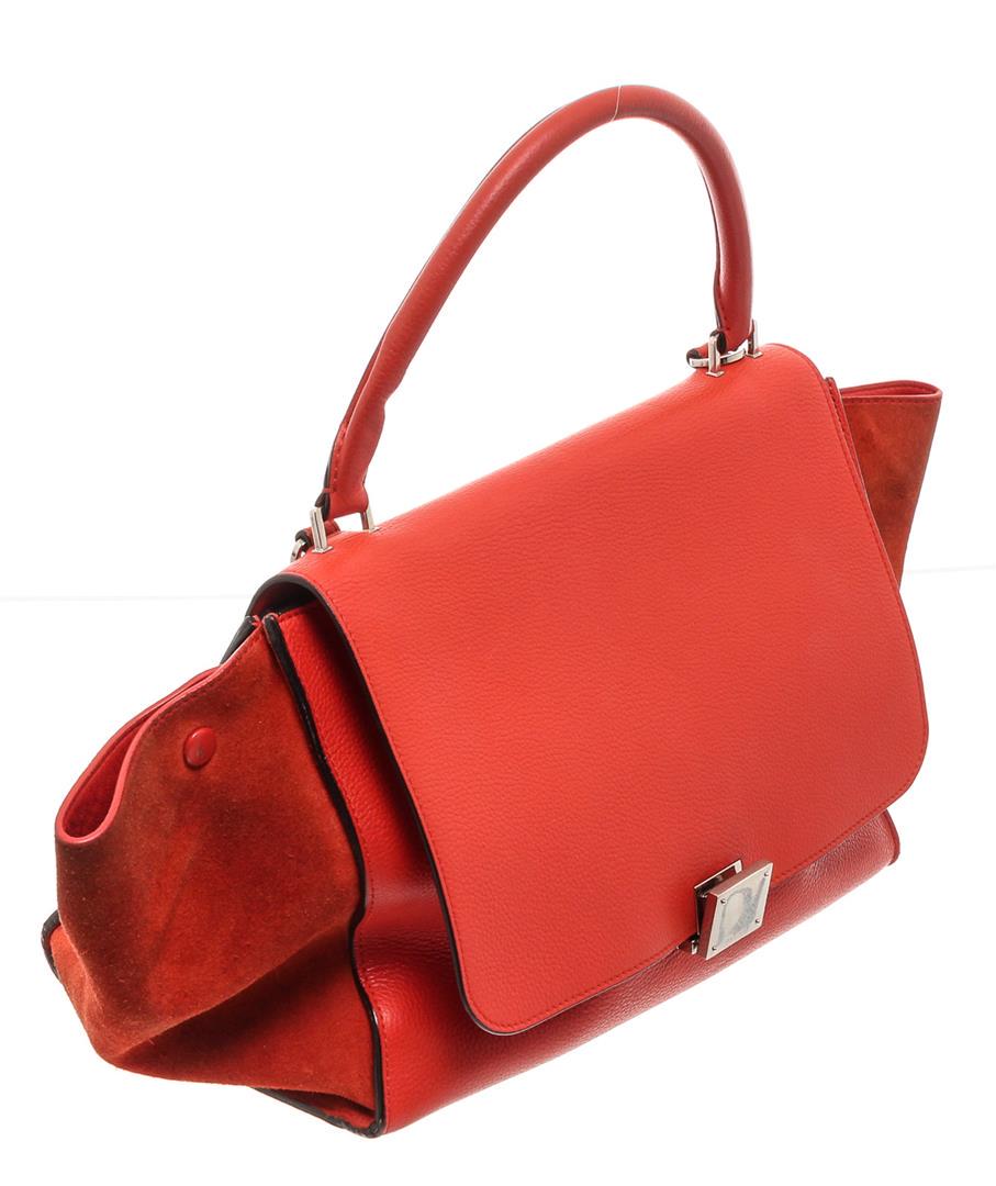 Celine Red Suede Leather Small Trapeze Shoulder Bag: One Celine Red Suede Leather Small Trapeze Shoulder Bag. Red leather CÃ©line Small Trapeze Bag with silver-tone hardware, single rolled top handle, detachable flat shoulder strap, dual side gussets