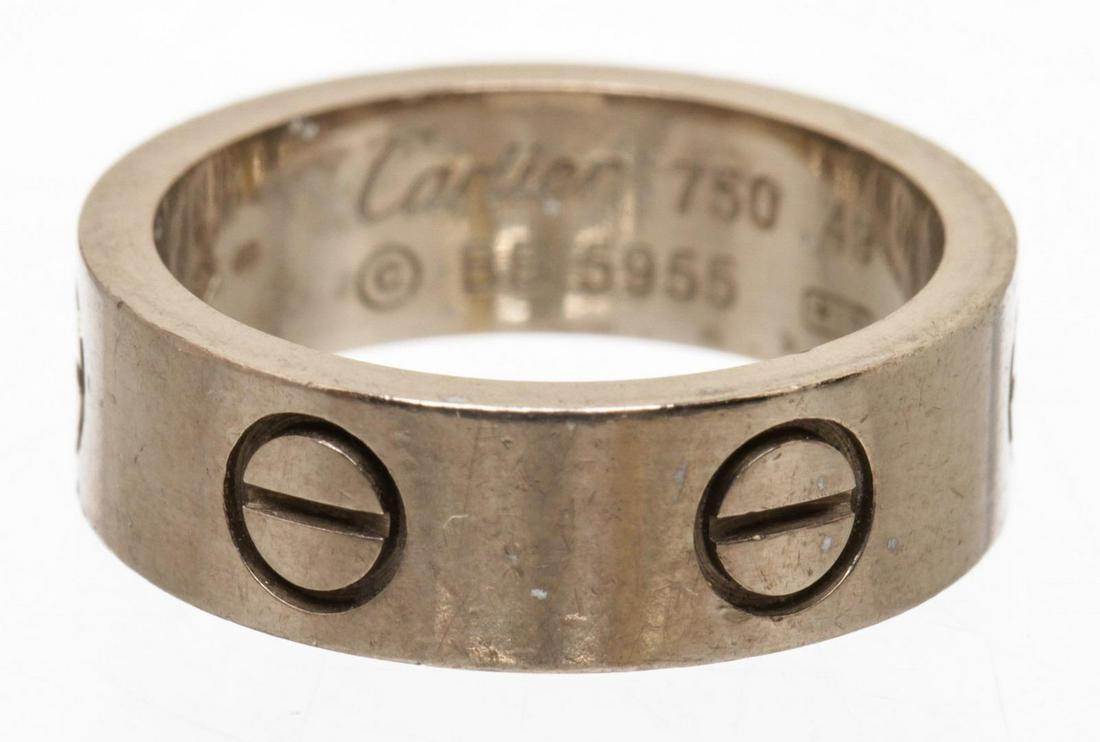 Cartier Rhodium-Plated 18K White Gold LOVE Ring 49: One Cartier Rhodium-Plated 18K White Gold LOVE Ring 49. Rhodium-plated K white gold Cartier LOVE Ring featuring designer screw motifs. Designer. Box and other accessories NOT included.