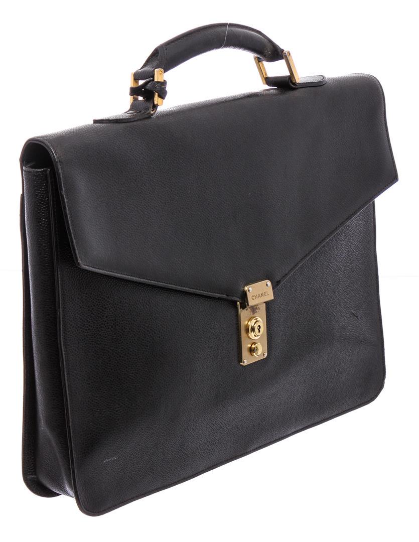 Chanel Vintage Black Caviar Leather Briefcase Bag: One Chanel Vintage Black Caviar Leather Briefcase Bag. Black Caviar leather vintage Chanel briefcase with gold-tone hardware, single rolled top handle, single slit pocket at back, tonal woven lining,