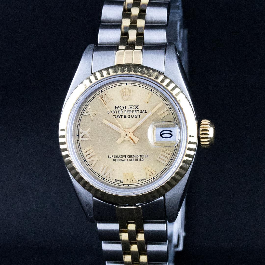 Rolex Ladies 2 Tone 14K Champagne Roman Fluted Datejust: One Ladies 14K Two Tone Rolex Datejust Polished, Serviced & Electronically Tested, 14K Yellow Gold & Stainless Steel Case: 26mm, 14K Yellow Gold Crown, Bezel: 14K Yellow Gold Fluted Bezel. Custom Crys