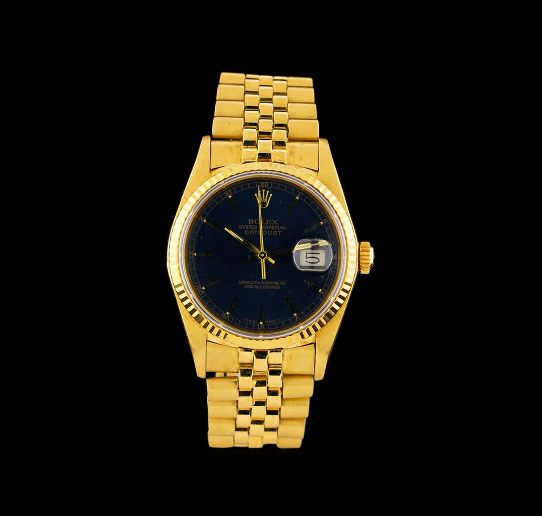 Rolex 18KT Yellow Gold DateJust Men's Watch: One Rolex DateJust men's watch featuring: Case: 18KT yellow gold. Bezel: 18KT yellow gold fluted. Crystal: Scratch-resistant sapphire. Dial: Blue color; gold tone hour markers. Features: Date window l