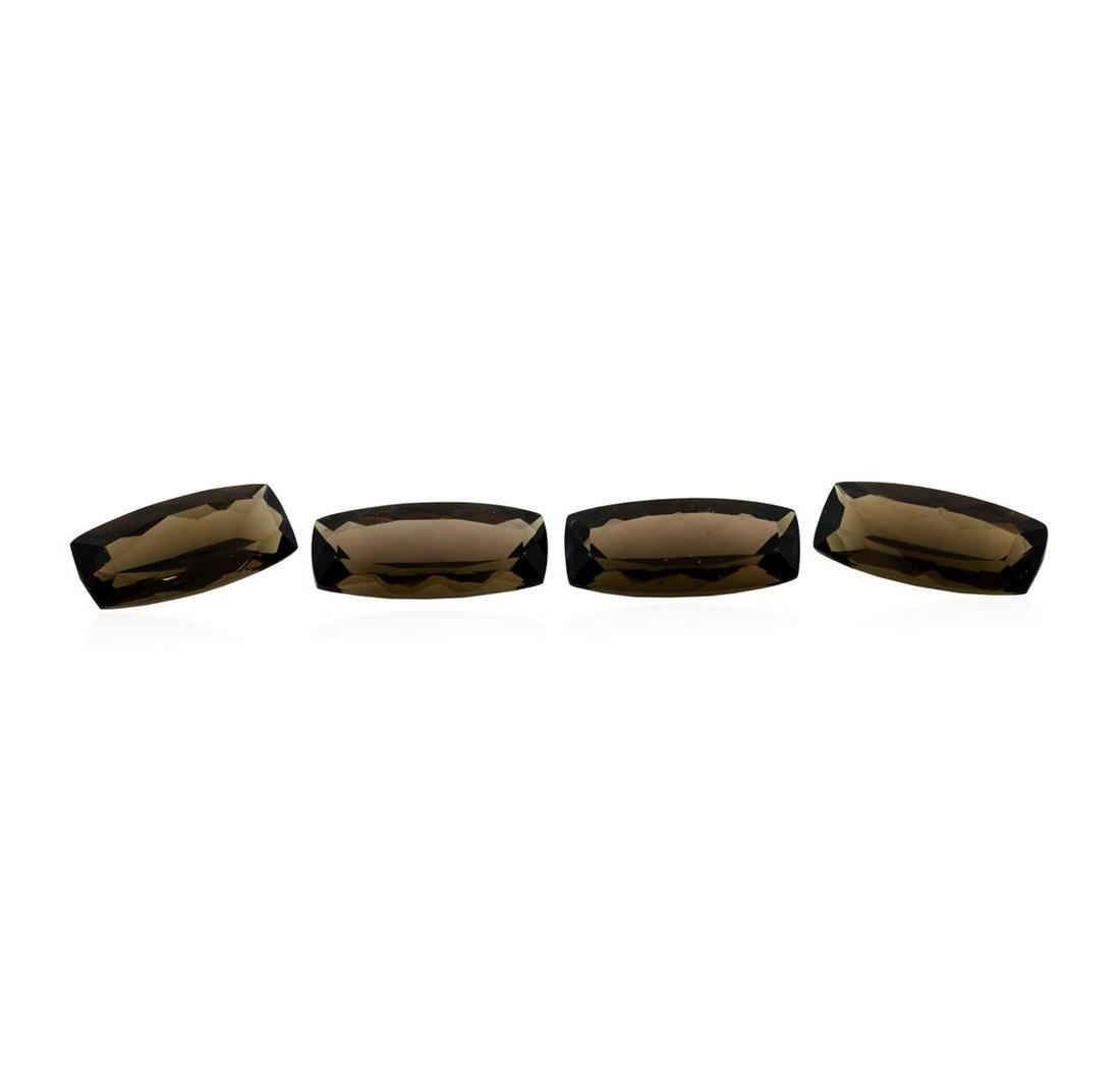10.09 ctw. Natural Cushion Cut Smoky Quartz Parcel of: One natural cushion cut smoky quartz parcel of four with an exact weight of 10.09ctw., clarity is eye clean, brown, medium. Gemological Appraisals Services estimates the retail value at $181.62 GAS Ap