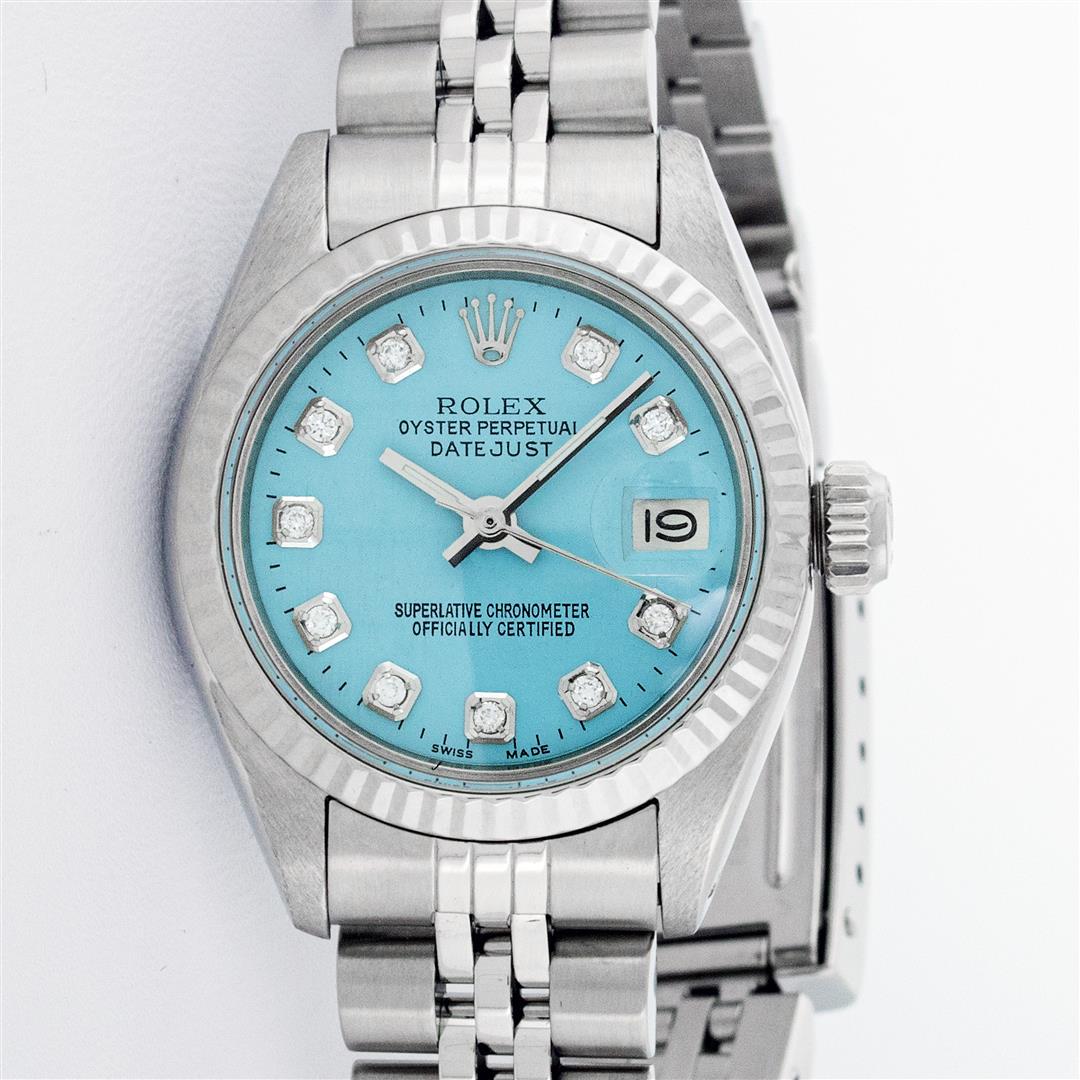 Rolex Ladies Stainless Steel Ice Blue Diamond 26MM: One Ladies Stainless Steel Rolex Datejust Polished Bright with Satin Finish, Serviced & Electronically Tested, Stainless Steel Case: 26mm, Stainless Steel Crown, Bezel: 14K White Gold Bezel. Custom Cr