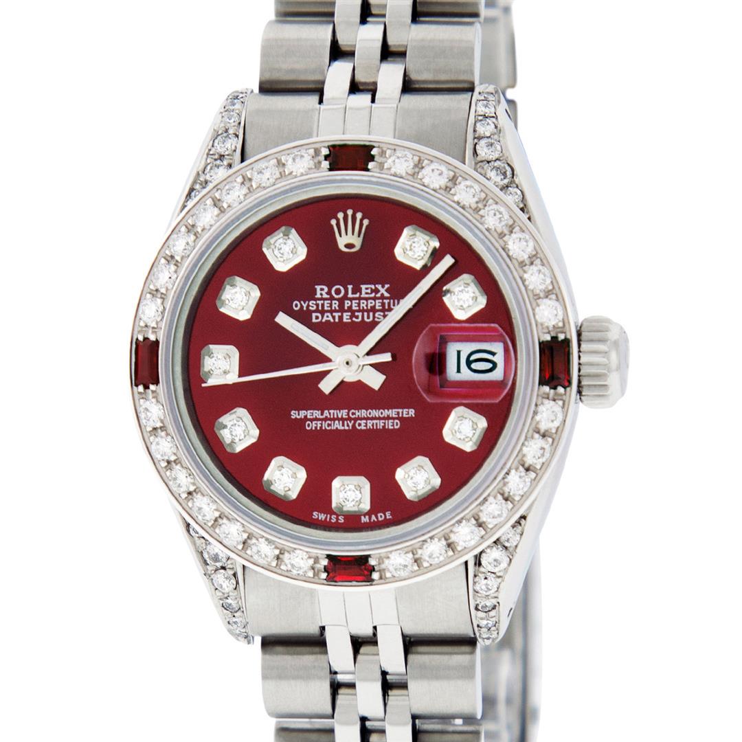 Rolex Ladies Stainless Steel Diamond Lugs & Ruby: One Ladies Stainless Steel Rolex Datejust Polished Bright with Satin Finish, Serviced & Electronically Tested, Stainless Steel Case: 26mm, Stainless Steel Crown, Diamond Lugs: 24 Diamonds On Lugs, Cla