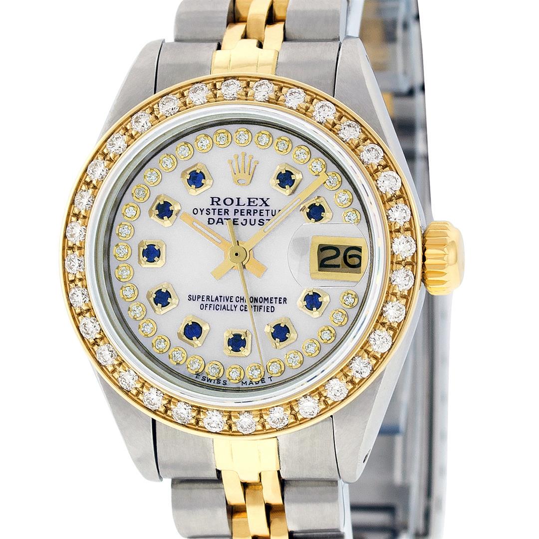 Rolex Ladies 2 Tone 14K MOP Sapphire String Diamond: One Ladies 14K Two Tone Rolex Datejust Polished, Serviced & Electronically Tested, 14K Yellow Gold & Stainless Steel Case: 26mm, 14K Yellow Gold Crown, Custom Bezel: New 18K Yellow Gold Beadset Diamon