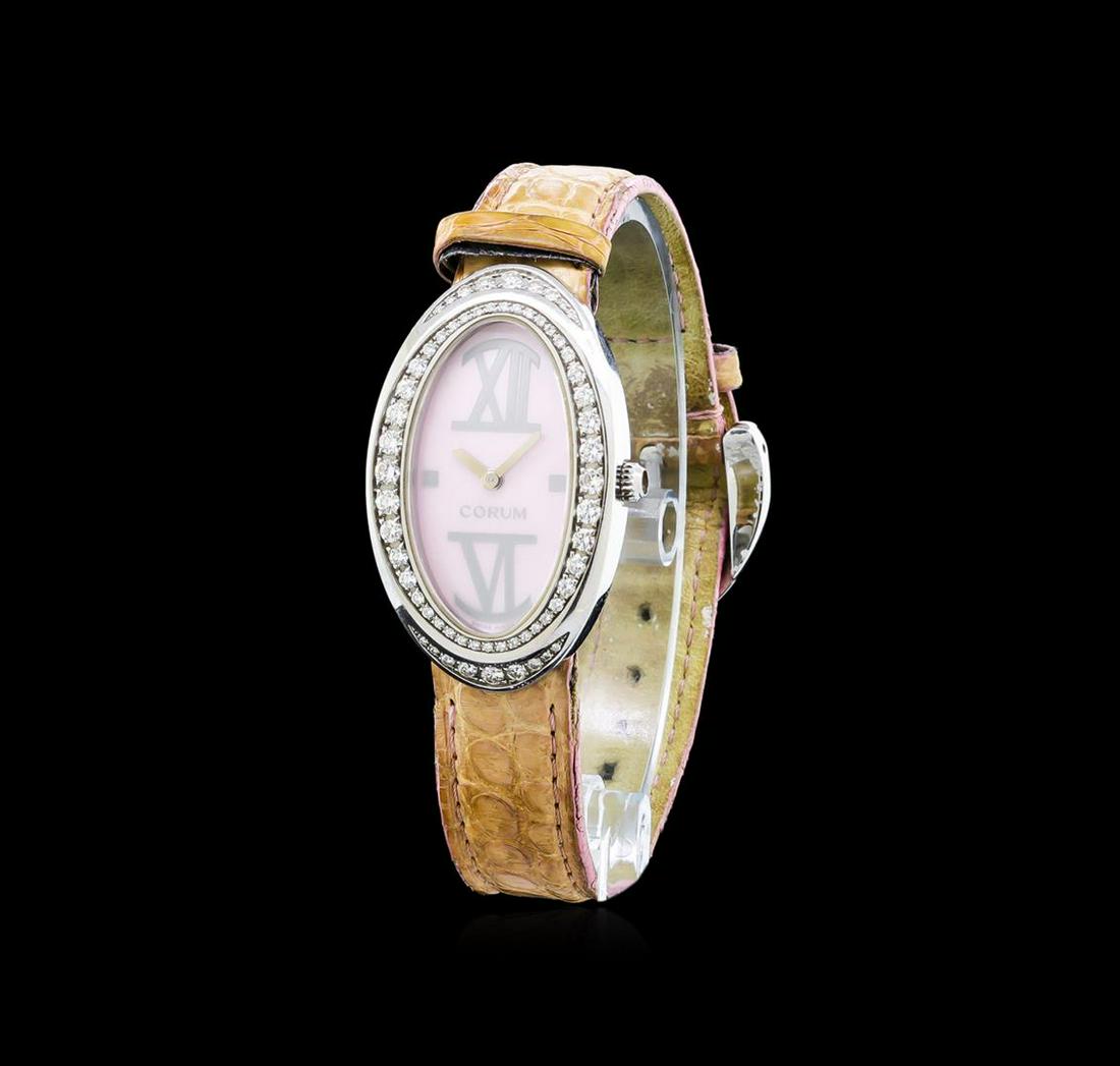 Corum Stainless Steel 1.00 ctw Diamond Ladies Watch: One, Lady Corum Diamond wristwatch electronically tested Stainless Steel, Case: 40 x 24mm, Case Back: engraved with manufacturers name, logo, and ID numbers, Crown: scalloped, Bezel: diamond set, Crys