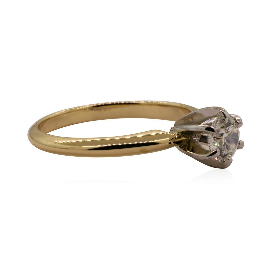 0.65 ctw Diamond Solitaire Ring - 14KT Yellow Gold: One lady's ring featuring: 14KT yellow gold weighing 2.9 grams containing one round brilliant diamond weighing 0.65ct.