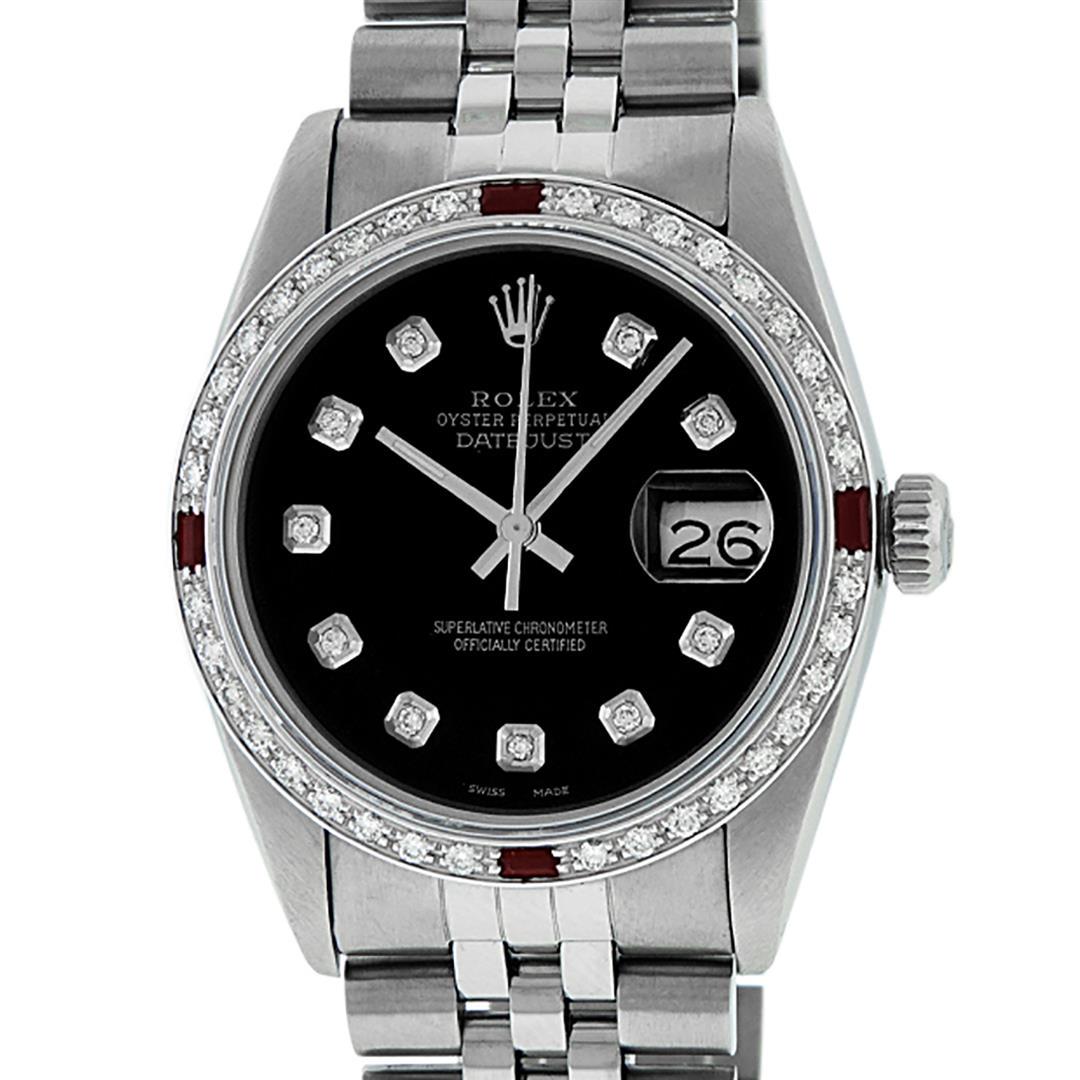 Rolex Mens Stainless Steel Black Diamond & Ruby: One Mens Stainless Steel Rolex Datejust Polished, Serviced & Electronically Tested, Stainless Steel Case: 36mm, Stainless Steel Crown, Custom Bezel: New 18K White Gold Ruby Beadset Diamond Bezel, Diam