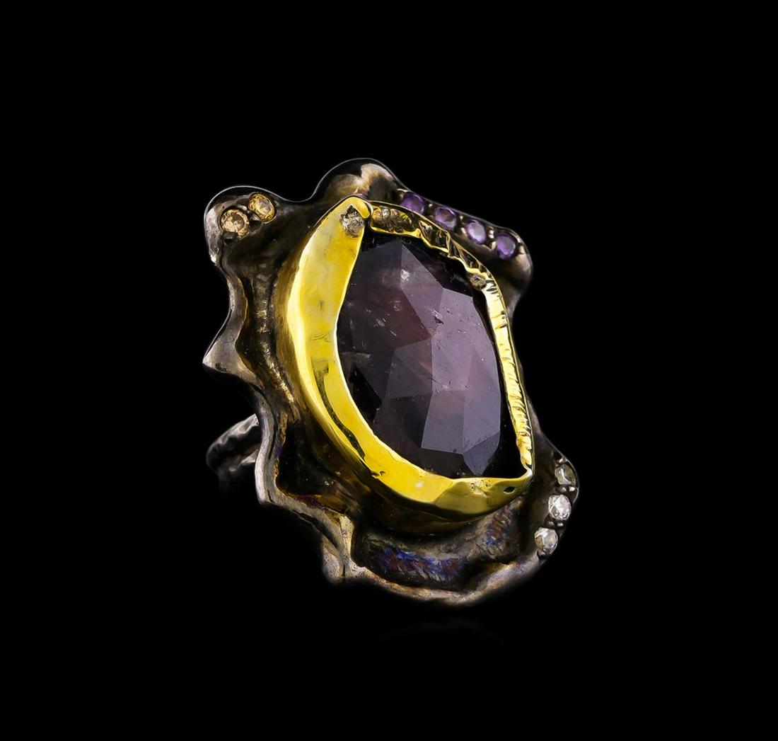Sterling Silver Ring: One of a kind high fashion sterling silver Ring weighing 14.5 grams. Black Antique texture. Containing: Ruby, Purple Crystal, White Crystal, Brown Crystal. This sterling silver promises a lasting shin