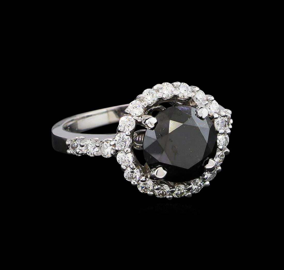 3.86 ctw Black Diamond Ring - 14KT White Gold: One ring featuring: 14KT white gold weighing 4.40 grams containing one black diamond with a total weight of 3.20ct and side diamonds with a total weight of 0.66ct.