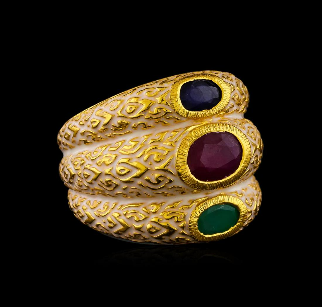Sterling Silver Ring: One of a kind high fashion sterling silver Ring weighing 13.8 grams. Containing: Emerald, Ruby, Sapphire, White Enamel Inlay. This sterling silver promises a lasting shine.