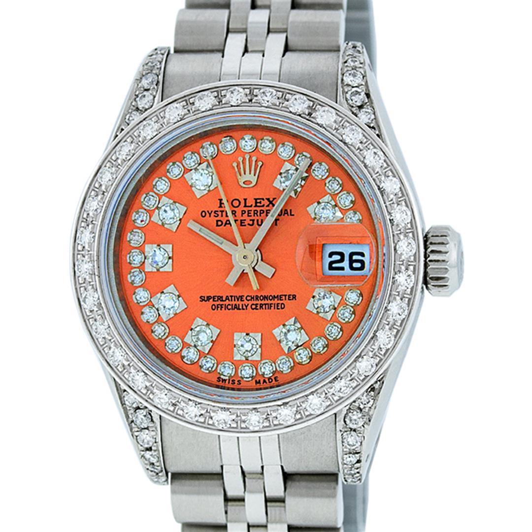 Rolex Ladies Stainless Steel 26MM Orange String Diamond: One Ladies Stainless Steel Rolex Datejust Polished Bright with Satin Finish, Serviced & Electronically Tested, Stainless Steel Case: 26mm, Stainless Steel Crown, Custom Diamond Lugs: 24 Diamonds On Lu
