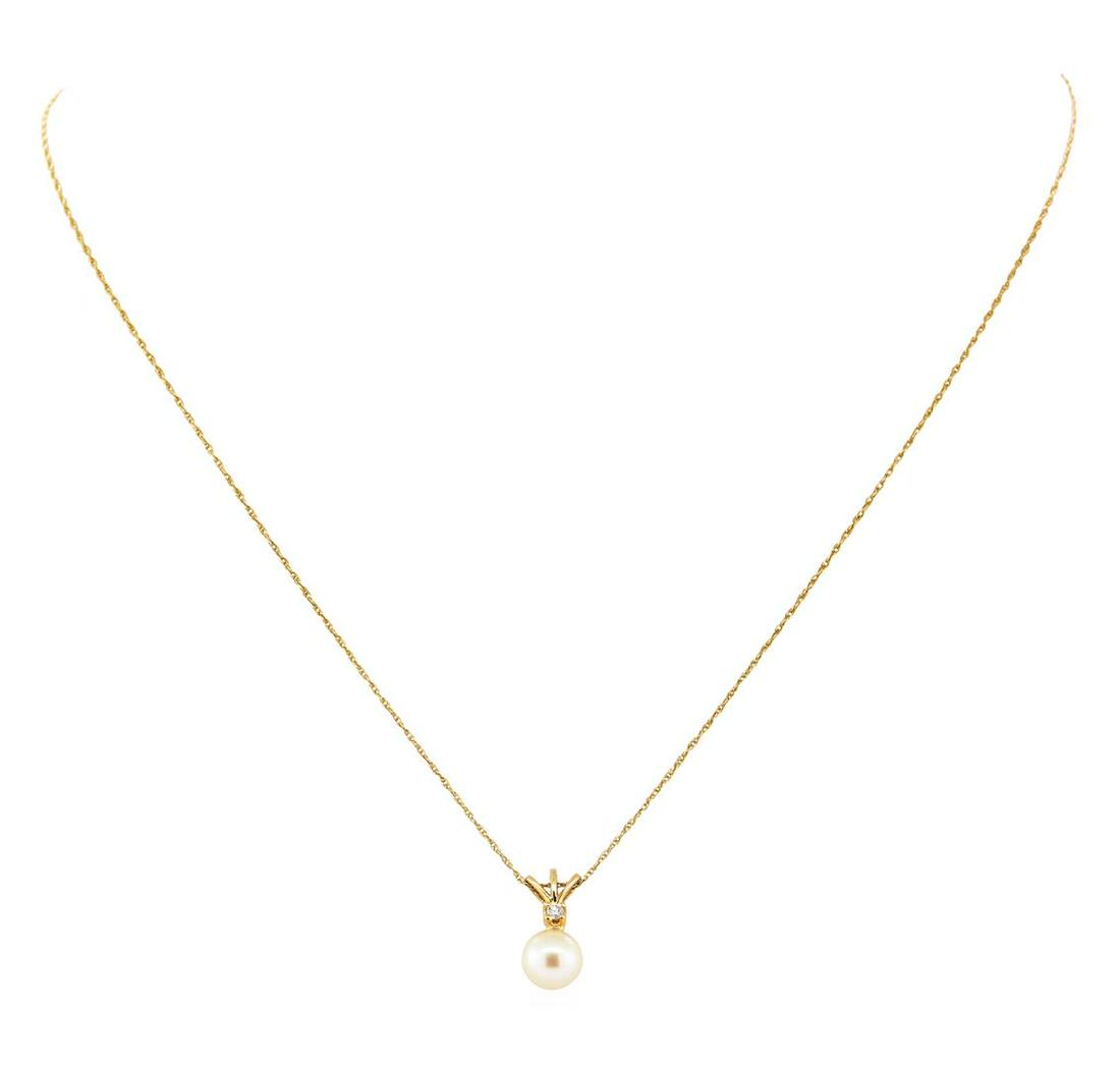 0.03 ctw Diamond and Pearl Pendant with Chain - 14KT: One pendant with an attached sixteen inch long loose rope chain featuring: 14KT yellow gold weighing 1.3 grams containing one diamond weighing 0.03ct and one white colored pearl measuring approximatel