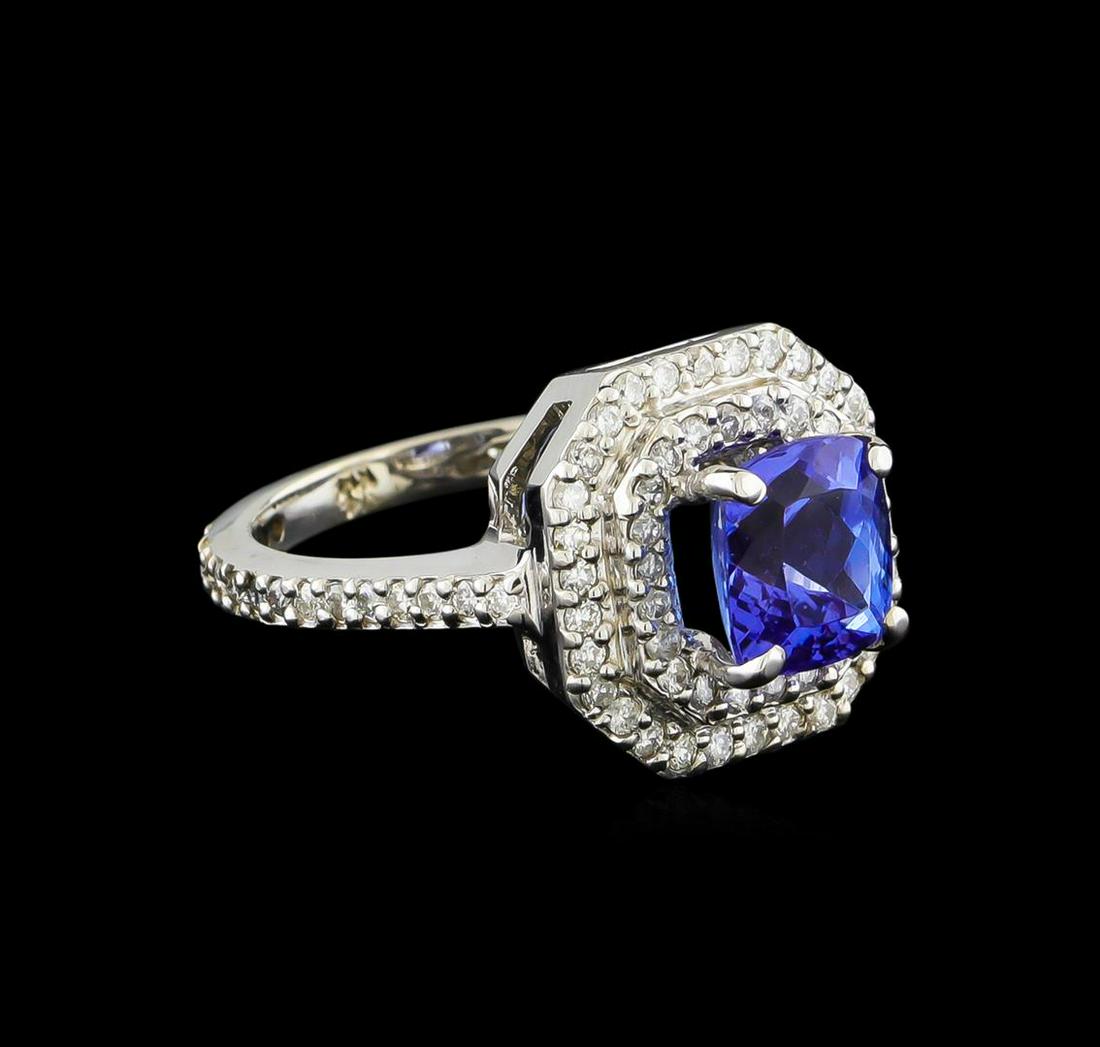 14KT White Gold 2.00 ctw Tanzanite and Diamond Ring: One electronically tested 14KT white gold ladies combination cast & assembled tanzanite and diamond ring with a flat shank with a bright polish finish. Identified with markings of "14K". Condition is 