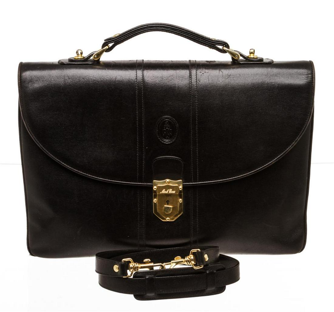 Mark Cross Black Leather Vintage Briefcase: One Mark Cross Black Leather Vintage Briefcase. Crafted out of black leather, gold-tone hardware, single flat handle.