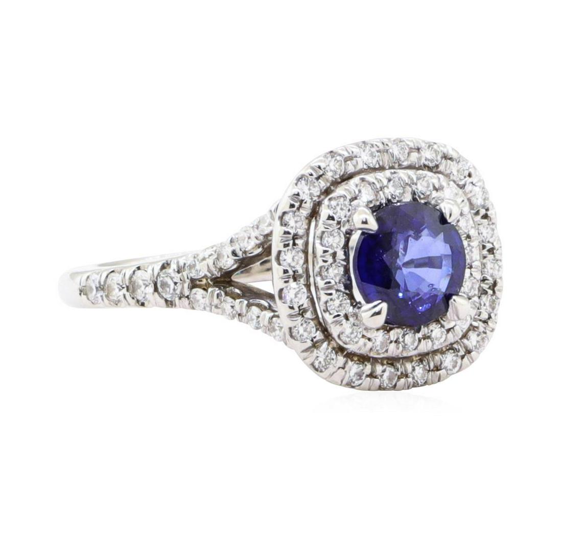 1.44 ctw Sapphire And Diamond Ring - 14KT White Gold: One electronically tested 14KT white gold lady's cast fashion double row halo ring with a split shank with a bright polish finish. The featured lady's ring has a shank measuring 1.95 millimeters in wi