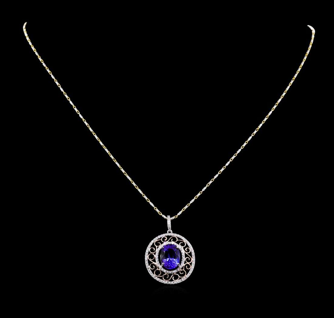 14KT Two-Tone Gold 4.32 ctw Tanzanite and Diamond: One electronically tested 14KT white and yellow gold Ladies combination cast & die struck pendant & chain 17.0" long, medium fancy cable link with a lobster claw clasp with a bright polish finish. Con