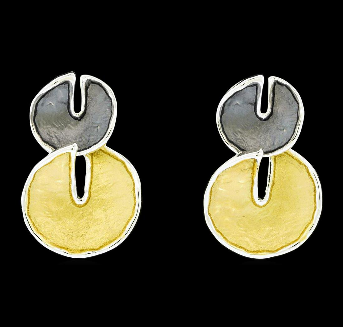 Double Circle Dangle Earrings - Rhodium Plated: High end designer jewelry. Double Circle Dangle Earrings - Rhodium Plated. Rhodium Plated Post Set. Gold/ Grey/ Slv. 1inch. Total Weight: 4.3 grams.