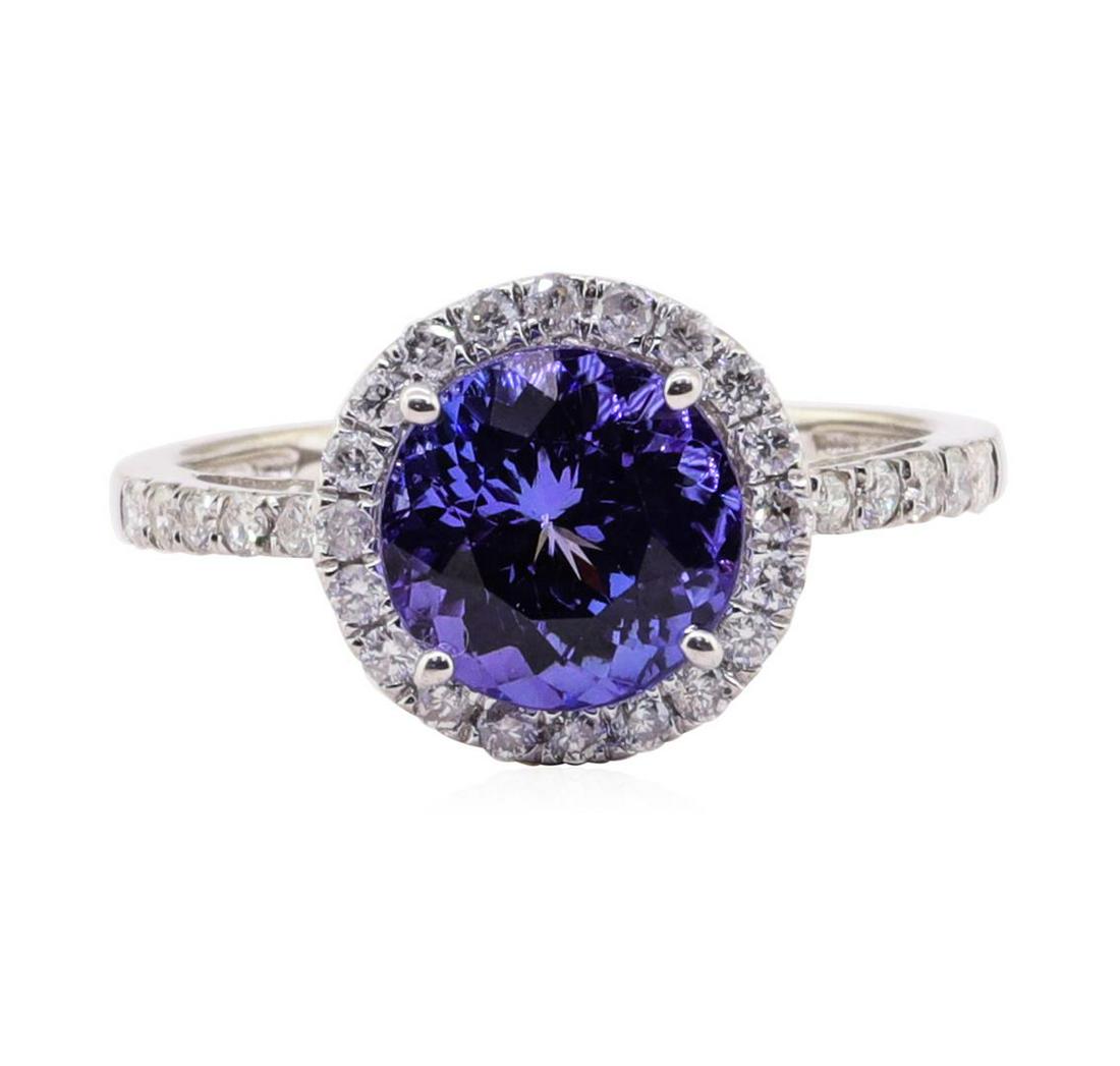 2.59 ctw Tanzanite and Diamond Ring - 14KT White Gold: One 2.59ct Tanzanite and Diamond Ring - 14KT White Gold . IAS certified. See Appraisal for more details.