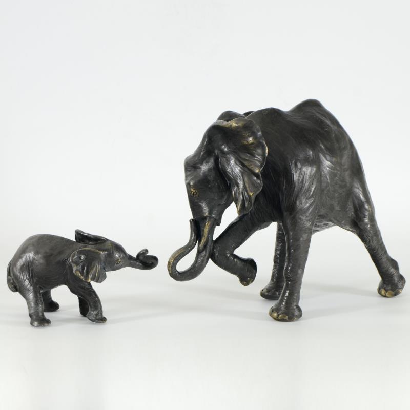 Mother and Child by Mason-Adams, Donna: "Mother and Child" is a limited edition bronze two piece sculpture set, numbered and signed by Donna Mason-Adams. Includes Certificate of Authenticity. Large elephant measures approx. 13" (width) x 5"