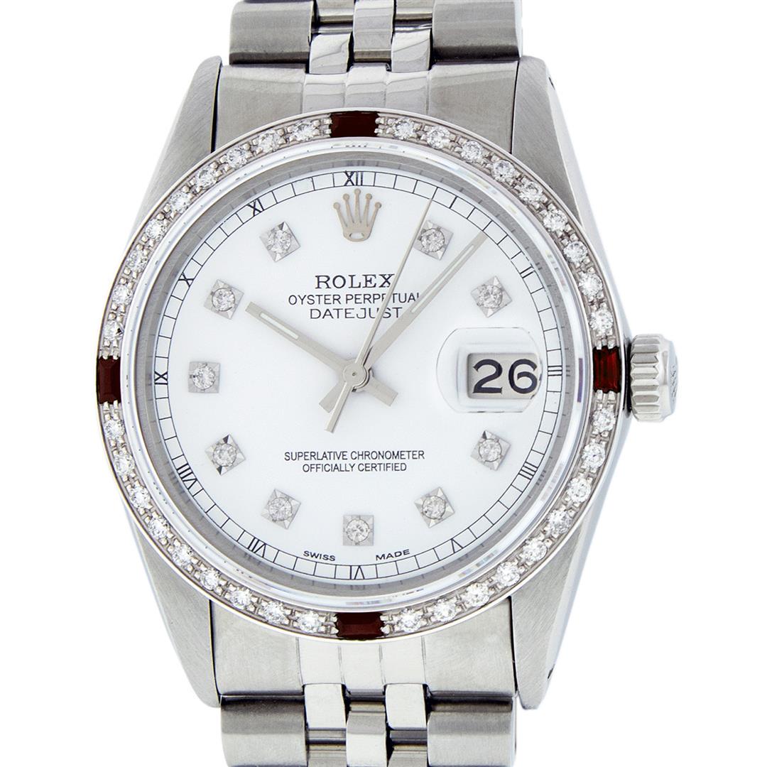 Rolex Mens Stainless Steel White Diamond & Ruby 36MM: One Mens Stainless Steel Rolex Datejust Polished, Serviced & Electronically Tested, Stainless Steel Case: 36mm, Stainless Steel Crown, Custom Bezel: New 18K White Gold Ruby Beadset Diamond Bezel, Diam