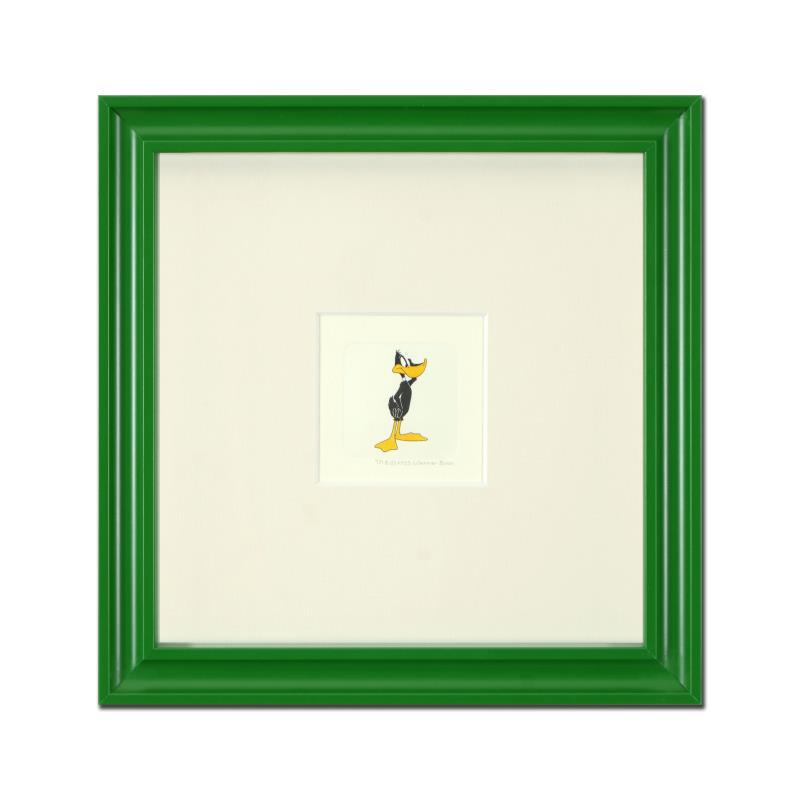 Daffy Duck (Looking to the Side) by Looney Tunes: "Daffy Duck (Looking to the Side)" is a limited edition etching on paper with hand-tinted coloring from Warner Bros, numbered and dated 1999. This piece comes framed. Measures approx. 9" x 9" (with fr