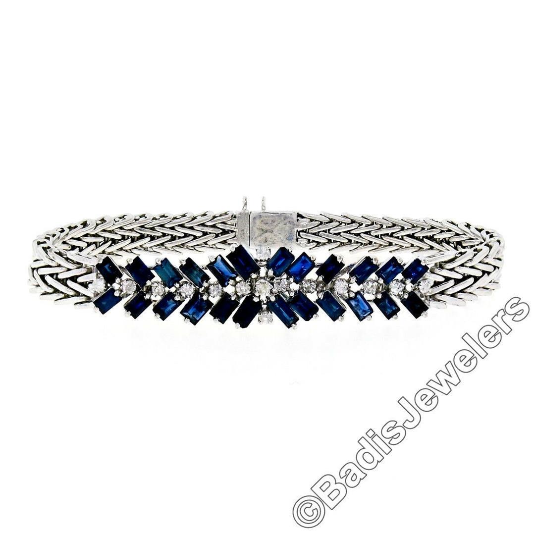 Vintage 14kt White Gold 3.45 ctw Sapphire and Diamond: A vintage 14kt white gold chain bracelet featruing a cluster of 3.00ctw of baguette cut sapphires and 0.45ctw of round single cut diamonds (G/H - SI1/SI2). It weighs a total of 24.92 grams, measures 1