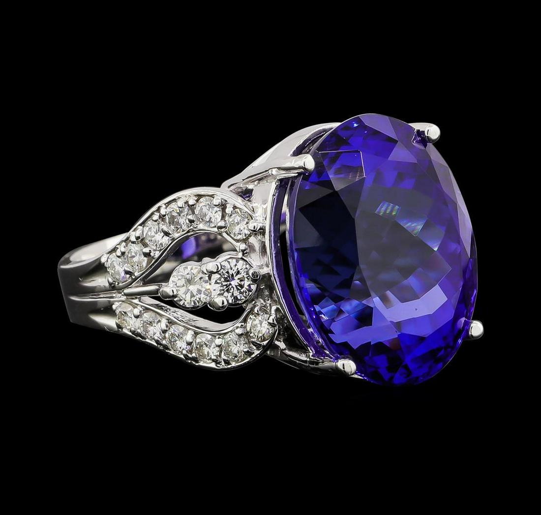GIA Cert 18.52 ctw Tanzanite and Diamond Ring - 14KT: One electronically tested 14KT white gold lady's cast fashion ring with a cathedral split shank with a bright polish finish. The featured lady's ring has a shank measuring 3.64 millimeters wide. Ident
