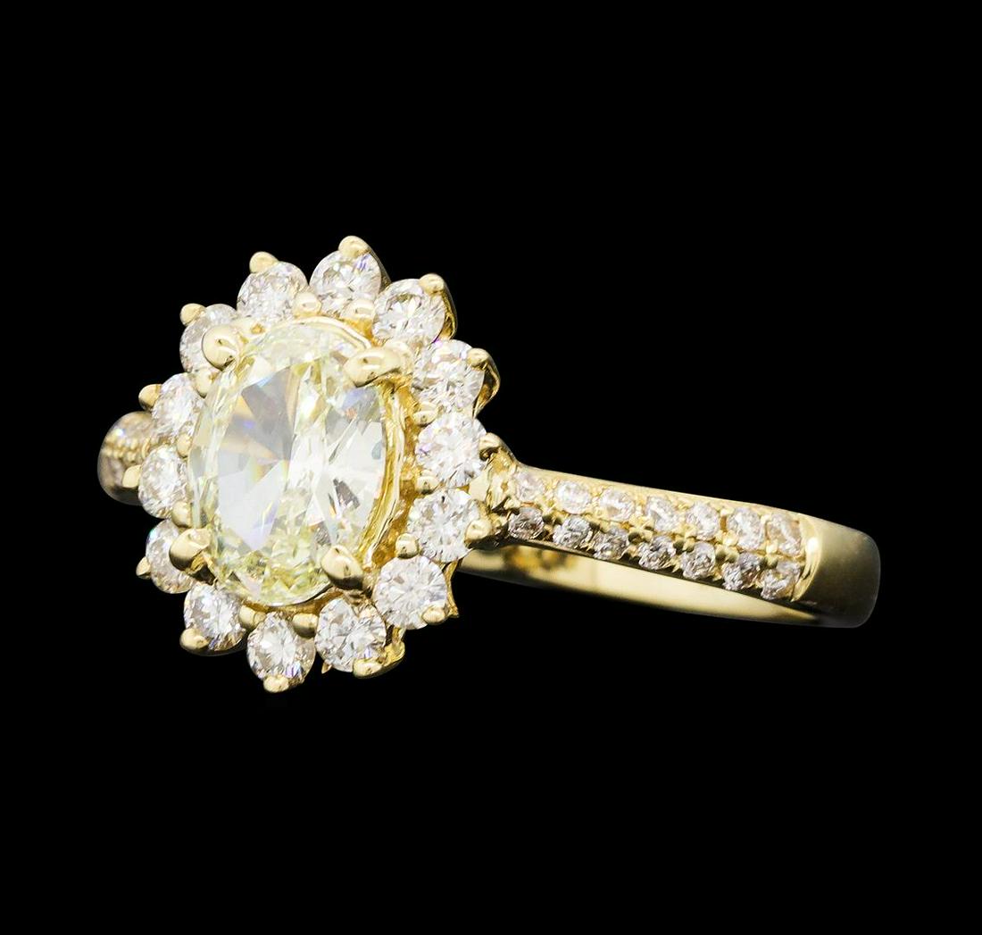 1.20 ctw Diamond Ring - 14KT Yellow Gold: One electronically tested 14KT yellow gold lady's cast wedding ring with a scalloped basket halo with a bright polish finish. The featured lady's ring has a shank measuring 2.20 millimeters wide. Iden