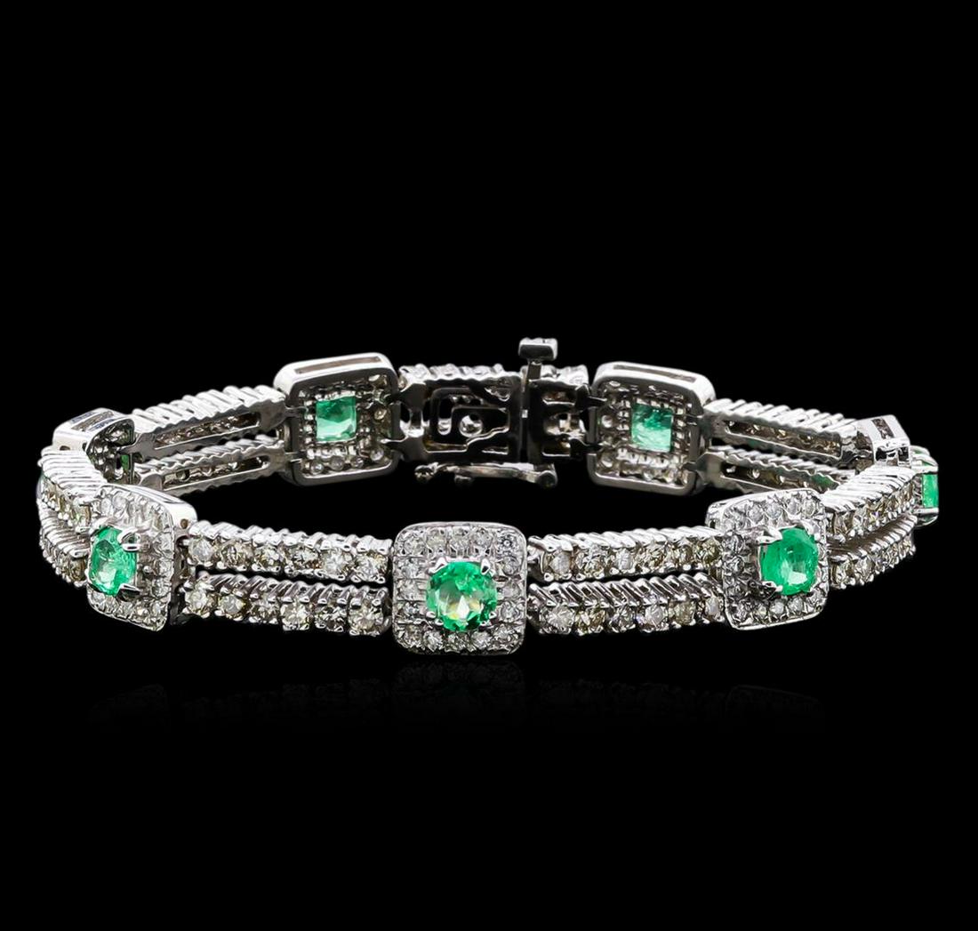 2.84 ctw Emerald and Diamond Bracelet - 14KT White Gold: One electronically tested 14KT white gold ladies cast & assembled emerald and diamond bracelet with a bright polish finish. Seven inch length bracelet composed of emerald and diamond bezels, supported
