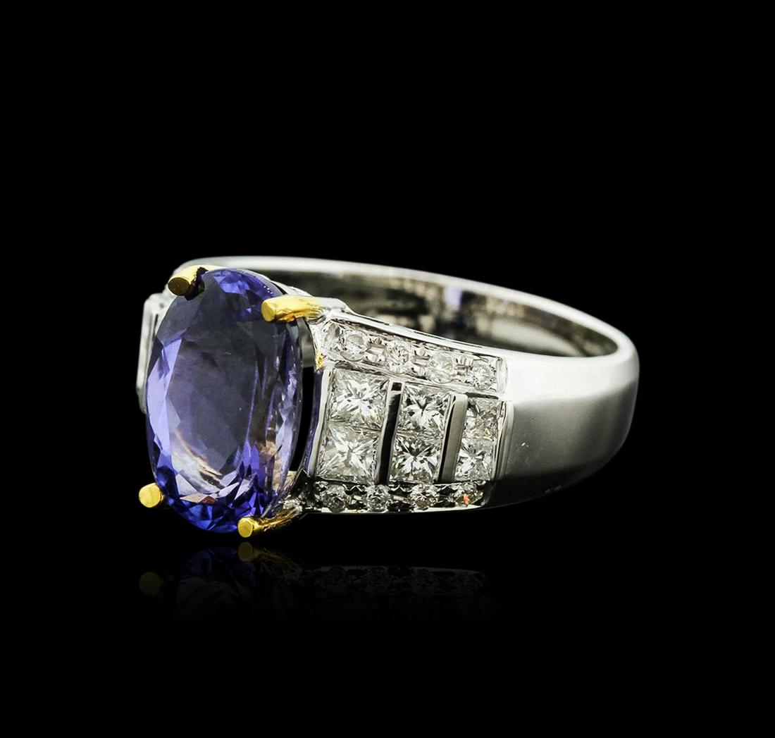 14KT Two-Tone Gold 3.91 ctw Tanzanite and Diamond Ring: One electronically tested 14KT white and yellow gold ladies cast tanzanite and diamond ring with a bright polish finish. Identified with markings of "14K". Condition is new. Containing: One prong set 