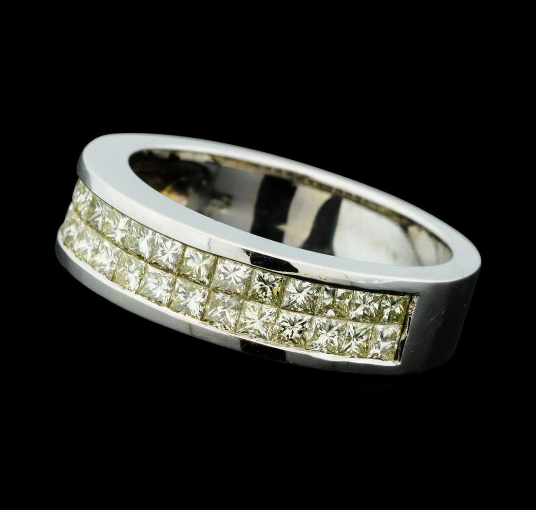 1.34 ctw Diamond Ring - 18KT White Gold: One electronically tested 18KT white gold man's cast wedding ring with a straight line motif with a bright polish finish. The featured man's ring has a shank measuring 5.68 millimeters wide. Identifie