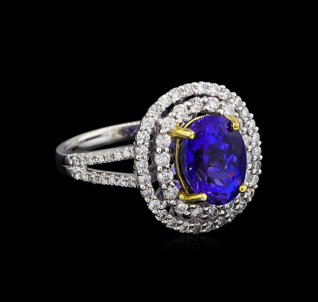 14KT White and Yellow Gold 3.20 ctw Tanzanite and: One electronically tested 14KT white and yellow gold Ladies combination cast & assembled ring with a bright polish finish. Condition is new. Identified with markings of "14K". Containing: One prong se