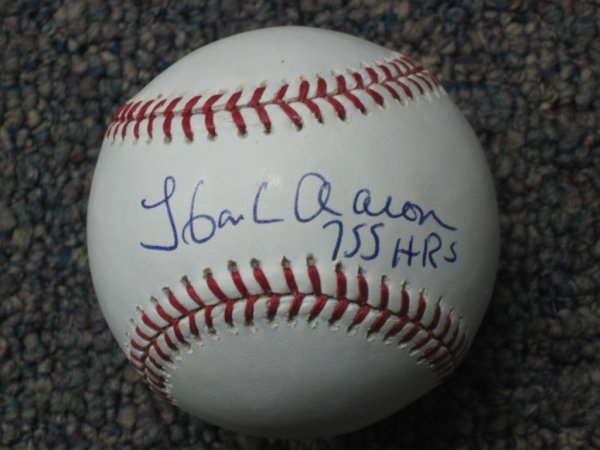 Hank Aaron Signed Baseball: You are bidding on a HANK AARON SIGNED BASEBALL. Hank Aaron is regarded by many as the "real" all-time Homerun King. His career 755 homers stood for over 30 years before Barry Bonds and the "steroid e