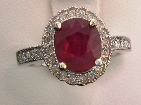 Ruby & Diamond Ring Oval Cut: You are bidding on a Ruby & Diamond Ring Oval Cut (GLA9) - This item's value has been appraised by Gemological Laboratory of American (GLA) for $13,432.00. The condition is NEW. The gemstones have be
